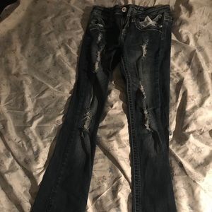 Boot cut ripped jeans